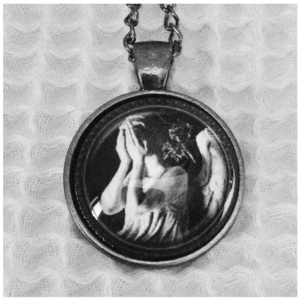 Dr. Who Weeping Angel Necklace